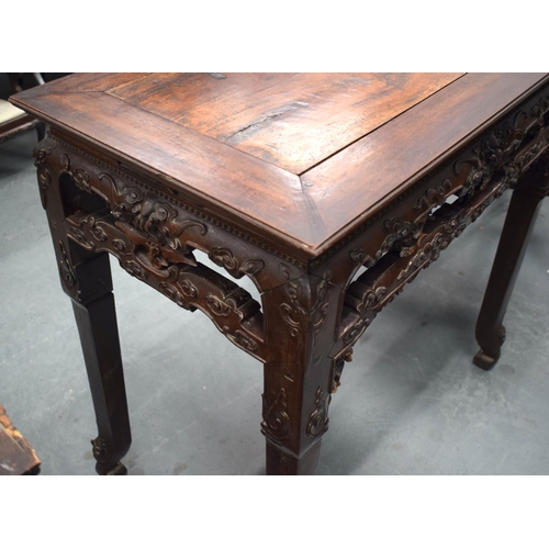 2171 - A FINE 19TH CENTURY CHINESE CARVED HONGMU HARDWOOD TABLE Qing, carved with mask heads and extensive ... 