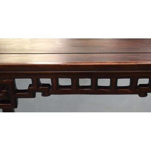 2175 - A STYLISH EARLY 20TH CENTURY CHINESE HARDWOOD HONGMU TABLE with foliate frieze and Greek key decorat... 