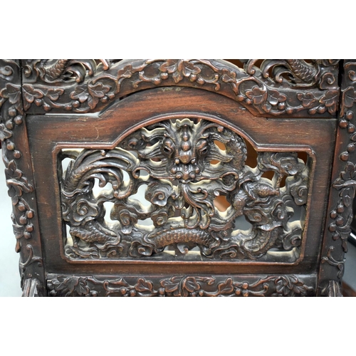 2176 - A 19TH CENTURY CHINESE CARVED HONGMU HARDWOOD MARBLE INSET CHAIR decorated with dragons. 102 cm x 40... 