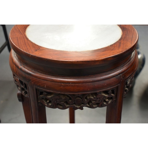 2177 - A 19TH CENTURY CHINESE MARBLE INSET HARDWOOD HONGMU STAND formed with a central floral interior. 80 ... 