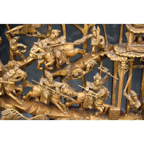 2178 - A LARGE PAIR OF 19TH CENTURY CHINESE CARVED WOOD TEMPLE PANELS Qing, depicting battle scenes. Wood 6... 