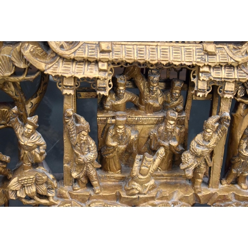 2178 - A LARGE PAIR OF 19TH CENTURY CHINESE CARVED WOOD TEMPLE PANELS Qing, depicting battle scenes. Wood 6... 