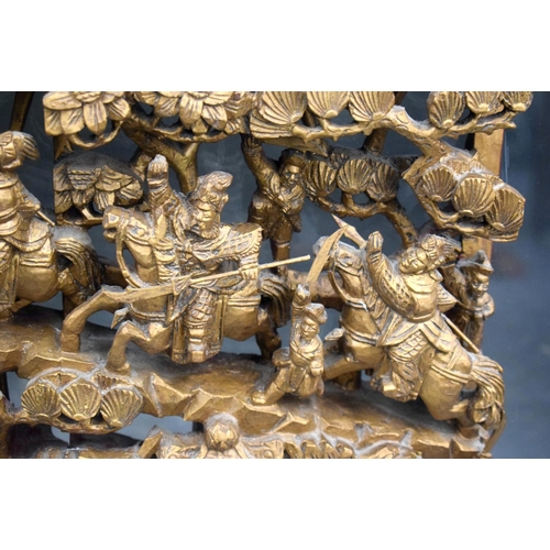 2178 - A LARGE PAIR OF 19TH CENTURY CHINESE CARVED WOOD TEMPLE PANELS Qing, depicting battle scenes. Wood 6... 