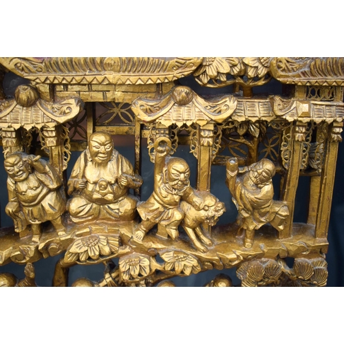 2179 - A LARGE 19TH CENTURY CHINESE CARVED WOOD TEMPLE PANEL Qing, depicting the eighteen luohans. Wood 62 ... 