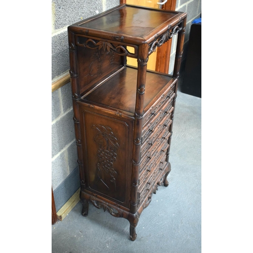 2182 - A RARE 19TH CENTURY CHINESE CARVED HONGMU HARDWOOD DISPLAY CABINET with six drawers and floral friez... 