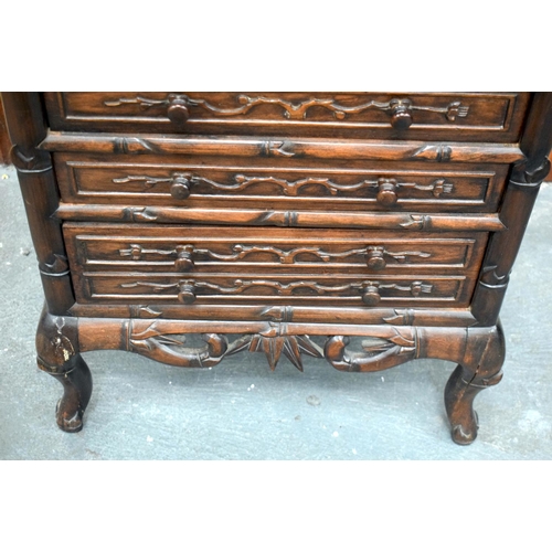 2182 - A RARE 19TH CENTURY CHINESE CARVED HONGMU HARDWOOD DISPLAY CABINET with six drawers and floral friez... 