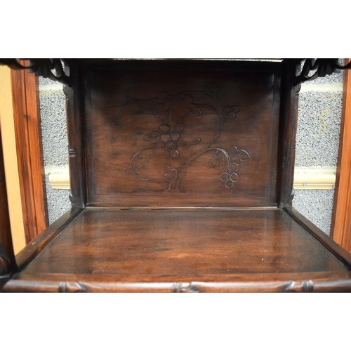 2182 - A RARE 19TH CENTURY CHINESE CARVED HONGMU HARDWOOD DISPLAY CABINET with six drawers and floral friez... 