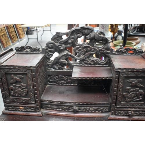 2185 - A 19TH CENTURY JAPANESE MEIJI PERIOD CARVED AND LACQUERED DESK decorated with birds and landscapes. ... 