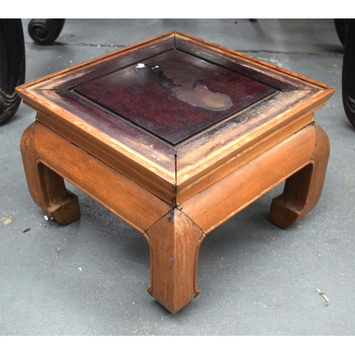 2186 - A SMALL EARLY 20TH CENTURY CHINESE HARDWOOD STAND of square form. 34 cm x 25 cm.