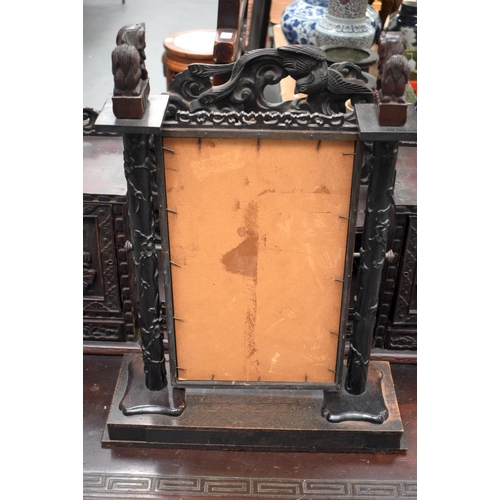 2187 - A 19TH CENTURY CHINESE HONGMU HARDWOOD DRESSING TABLE MIRROR with buddhistic lion mounts. 60 cm x 38... 