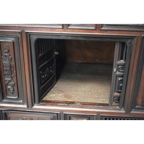 2189 - AN UNUSUAL EARLY 20TH CENTURY CHINESE CARVED HARDWOOD HONGMU CABINET Late Qing/Republic, decorated w... 