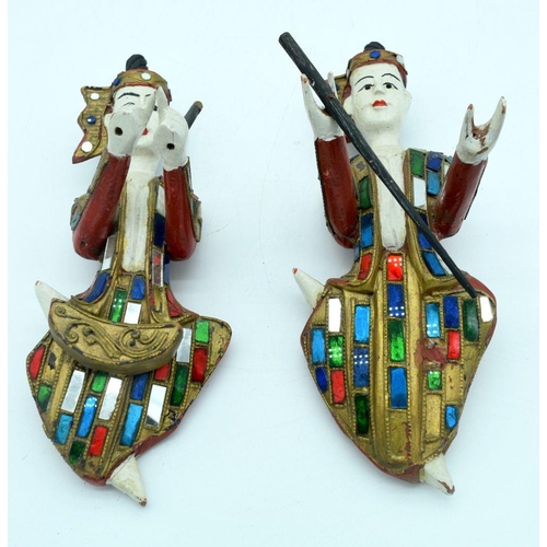 2500 - A vintage lighter and two wooden Thai figures (29cm)