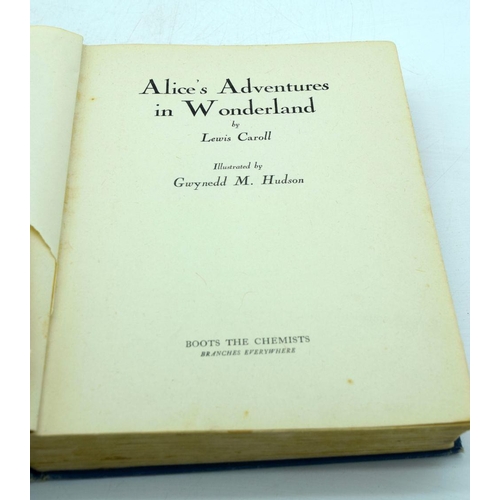 2506 - A rare copy of Alice's adventures in Wonderland Boots special edition with colour plates .