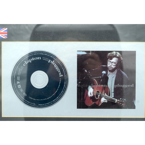 2539 - Eric Clapton Framed Presentation  Award CD of The Eric Clapton Unplugged Concert 300,000 copies 41 x... 