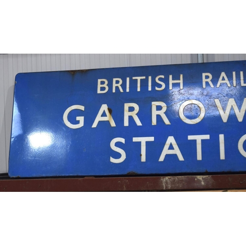 2550 - A large enamelled metal British railways sign of Garrowhill station 246 x 72 cm