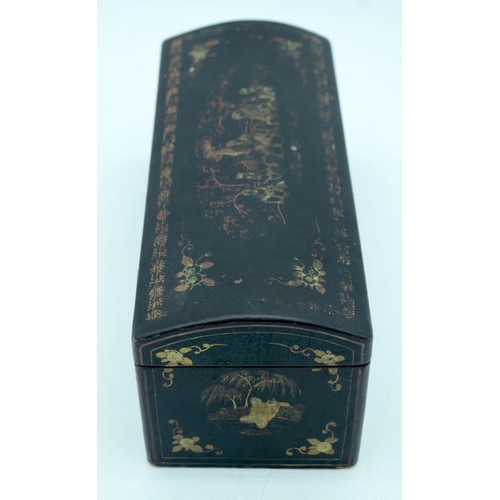 2553 - A Chinese Wooden lacquered box 27 x 10 cm.