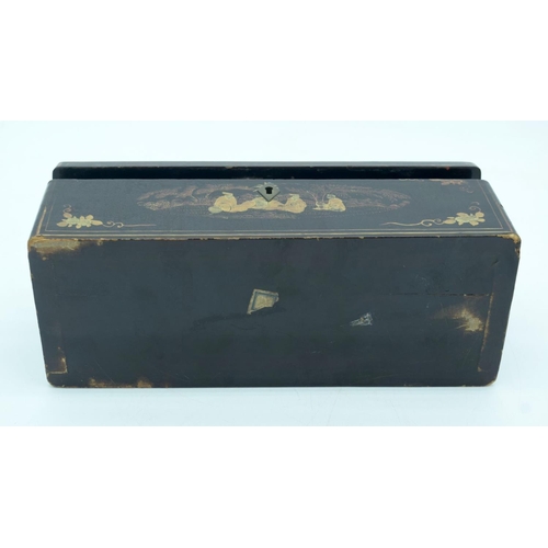 2553 - A Chinese Wooden lacquered box 27 x 10 cm.