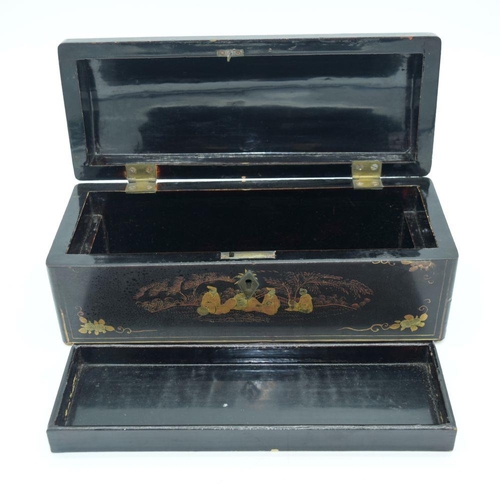 2553 - A Chinese Wooden lacquered box 27 x 10 cm.