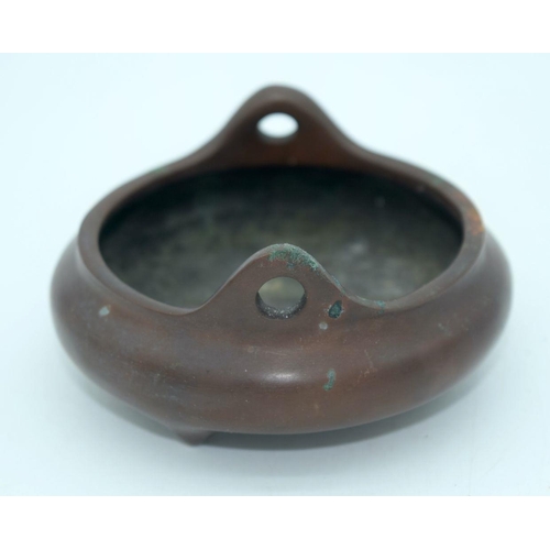 2557 - A small Chinese  bronze censer 10cm x 3.5 cm.