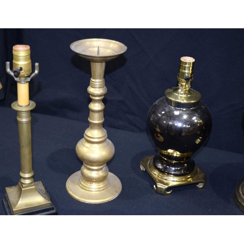 2561 - Collection of brass lamp bases, candle sticks and hanging lights largest 47cm. Qty.