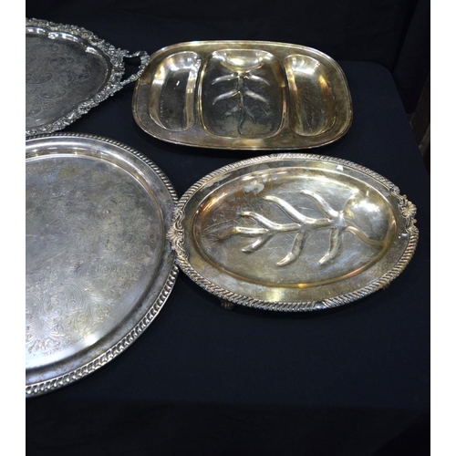 2562 - Collection of large silver plated serving salvers  Largest 74 x 17 cm (7).