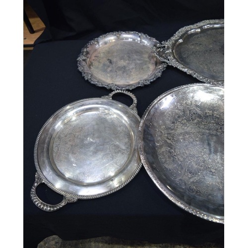 2562 - Collection of large silver plated serving salvers  Largest 74 x 17 cm (7).