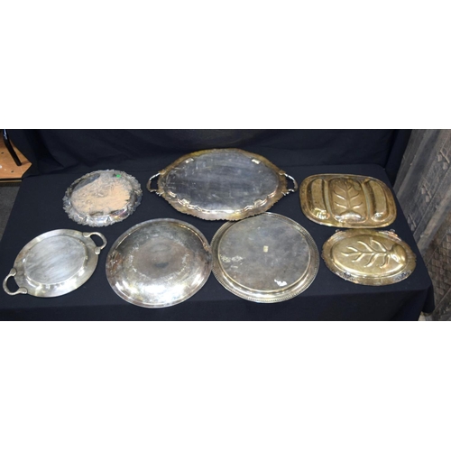 2562 - Collection of large silver plated serving salvers  Largest 74 x 17 cm (7).