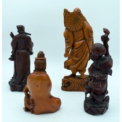 2564 - Two Chinese hardwood figures together with two other figures largest 39cm (4)