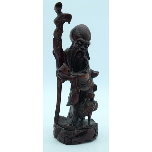 2564 - Two Chinese hardwood figures together with two other figures largest 39cm (4)