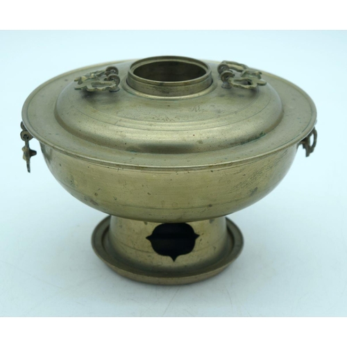 2574 - A Chinese Brass lidded censer 20 x 13cm.