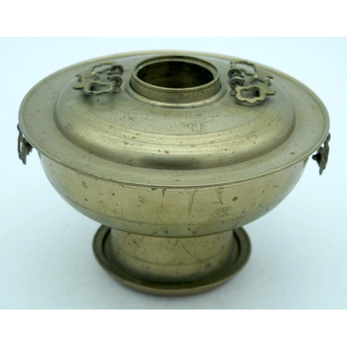 2574 - A Chinese Brass lidded censer 20 x 13cm.