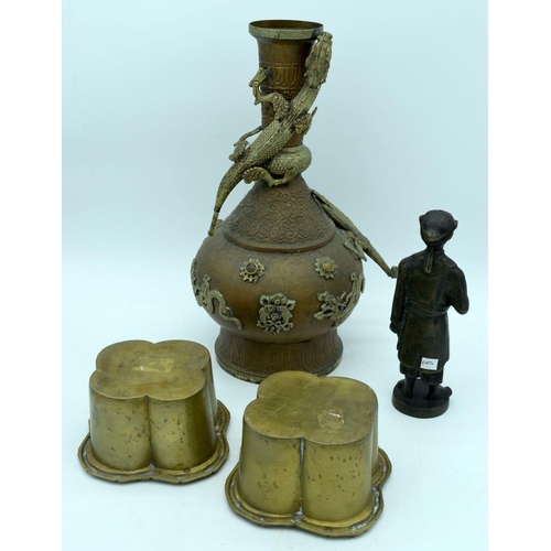 2583 - A large Chinese metal dragon vase, a bronze figure of a Chinese man servant and two planters. (4)