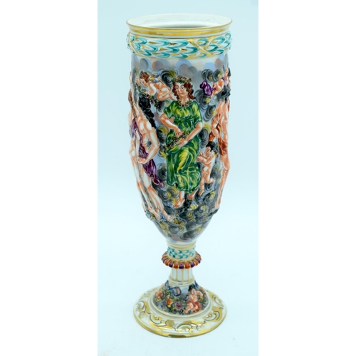 2584 - A large Capodimonte vase decorated with nudes in relief , a European ceramic candlestick and a lidde... 