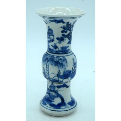 2592 - A small Chinese GU blue and white vase. 16cm.