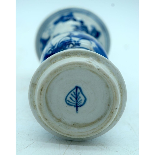 2592 - A small Chinese GU blue and white vase. 16cm.