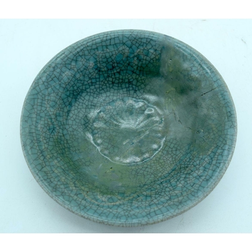 2599 - A small green glazed fruit pod brush rest together with a crackle glazed dish 15 x 18cm.