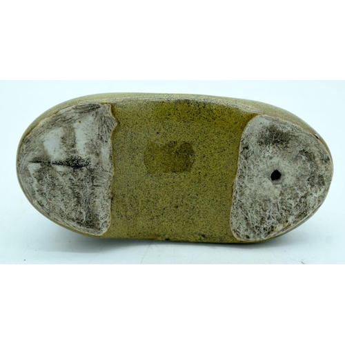 2599 - A small green glazed fruit pod brush rest together with a crackle glazed dish 15 x 18cm.