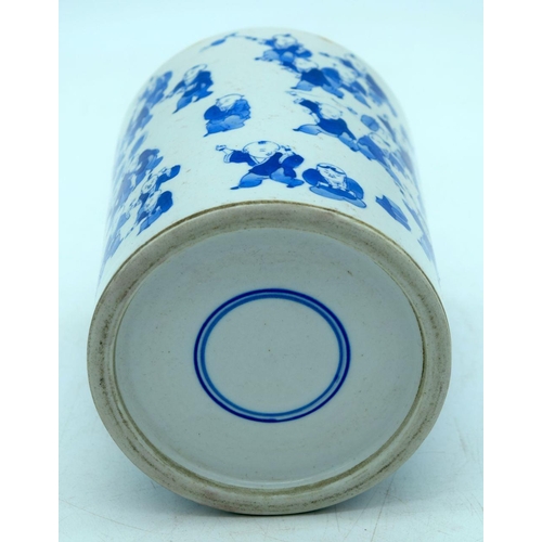 2605 - A Chinese Blue and white brush pot decorated with 100 children pattern. 15 x 12cm.