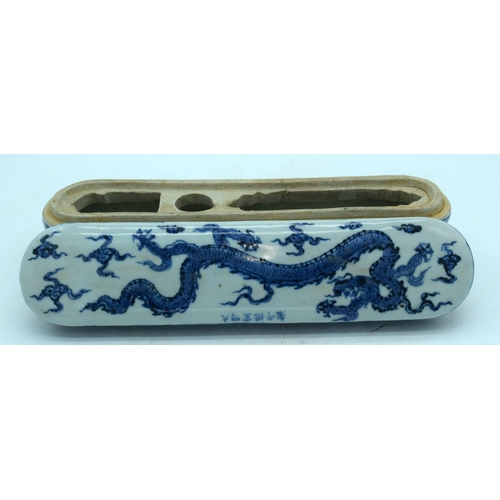 2619 - Chinese blue and white lidded porcelain box decorated with a dragon 32.5 x 8 cm .