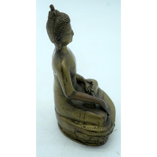 2620 - A Chinese/Tibetan bronze Buddha. 20 x 13 cm.