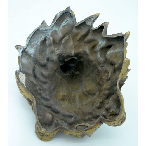 2623 - A Bronze lions head wall hanging .