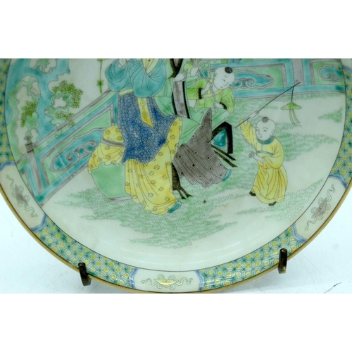 2625 - A Chinese Famille verte bowl decorated with figures 21cm.