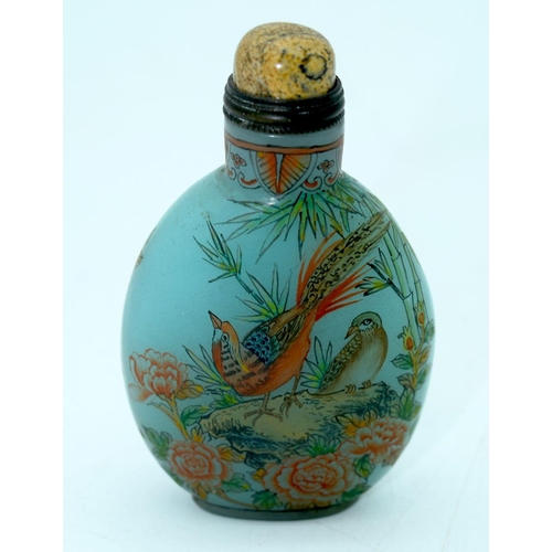 2633 - A Chinese snuff bottle decorated with birds and foliage. 8.5 cm.