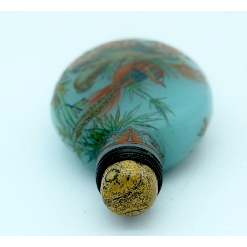 2633 - A Chinese snuff bottle decorated with birds and foliage. 8.5 cm.