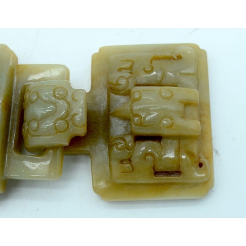 2643 - A Chinese Jade belt buckle 10 x 6.5cm.