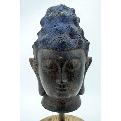 2647 - A large bronze Chinese Tibetan head on a stand 37cm