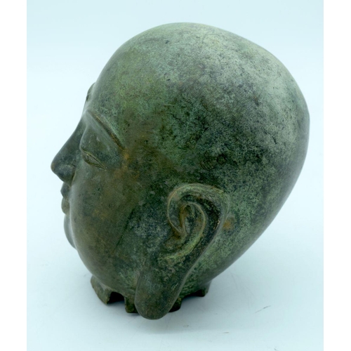 2649 - A Tibetan Bronze Buddha head 19cm.