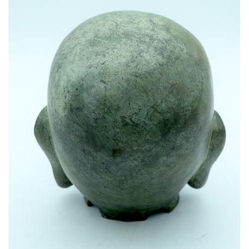 2649 - A Tibetan Bronze Buddha head 19cm.