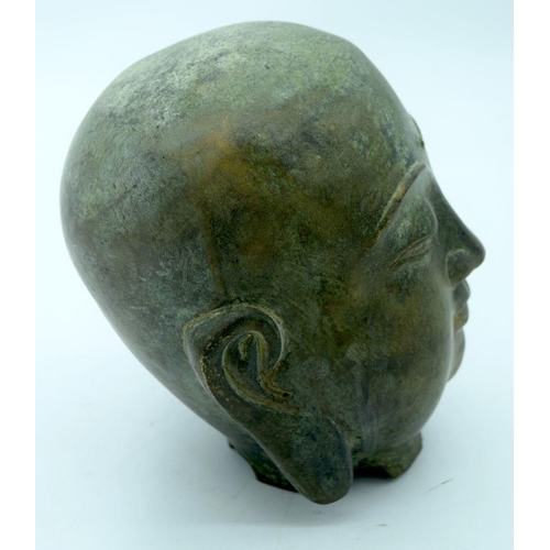 2649 - A Tibetan Bronze Buddha head 19cm.