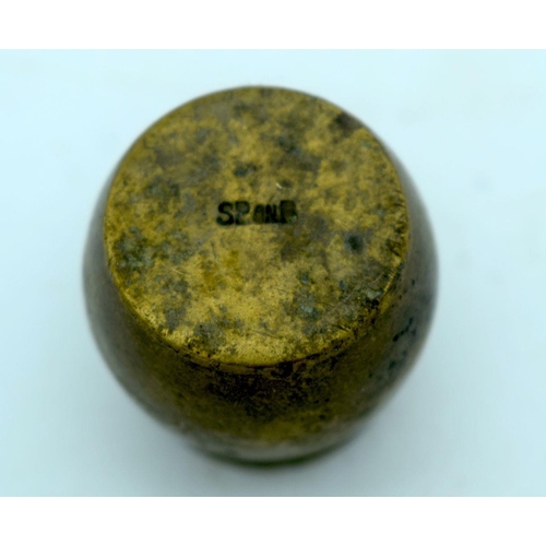 2657 - A small bronze set of graduated weights together with two other bronze items. 7cm (3)